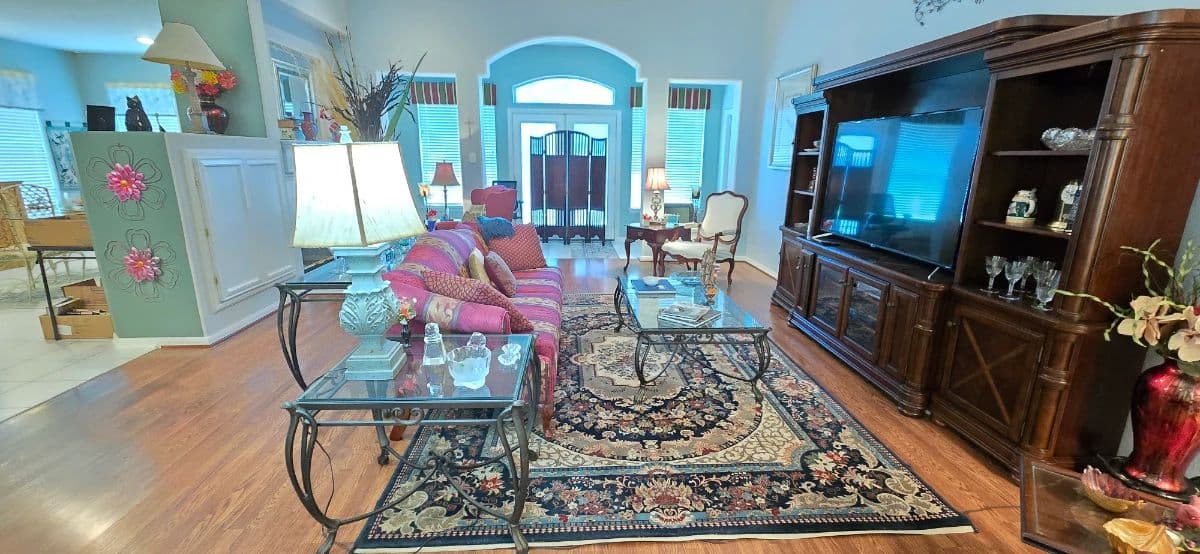 Cypress Mills Color Story: Magenta Seating, Gold-Framed Portraits & Statement Living Room Pieces